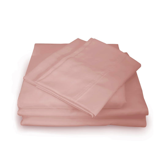Blush queen bed sheet set with matching pillowcases, neatly folded