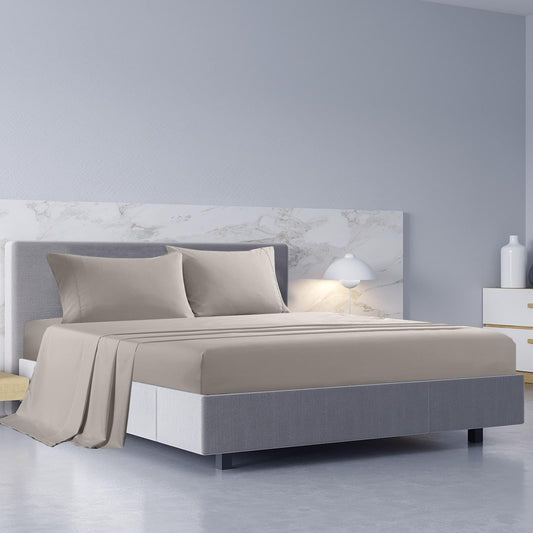 Dove light gray sheet set on a queen bed with matching pillowcases