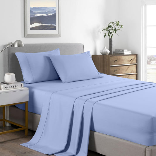 Light blue king sheet set with matching pillowcases on bed