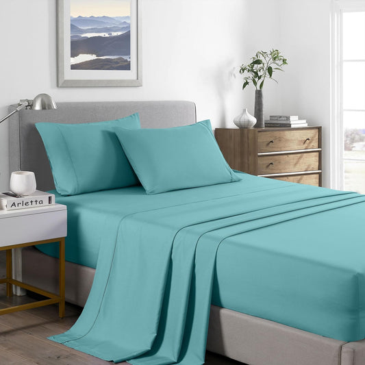 Queen aqua bedding set on bed, featuring pillowcases and fitted flat sheet