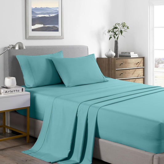 Aqua sheet set on single bed with matching pillowcases and flat sheet
