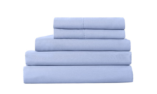 Light blue folded sheet set stack with neatly creased bedding