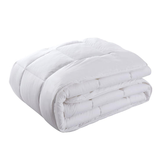 White double quilt rolled and stacked, padded baffles