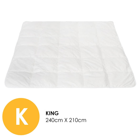 White king-size quilt shown flat with smooth box quilting