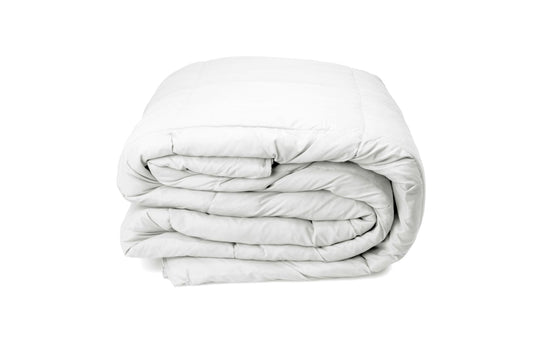 White bamboo all-seasons quilt duvet, neatly rolled and layered