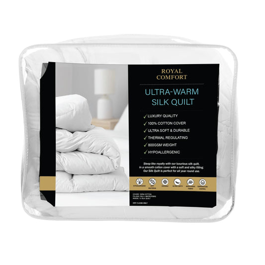 Ultra-warm white silk quilt duvet in clear bag, showing product label and fold
