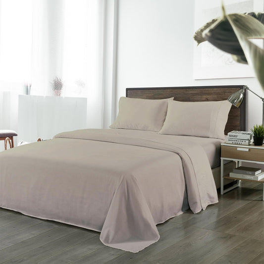 Warm grey bedding set with fitted sheet and two pillowcases on a bed