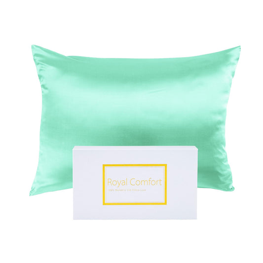 Mint satin silk pillowcases set with matching paper insert on a white background