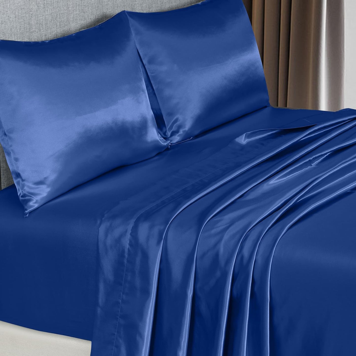 Navy satin pillowcases and flat sheet with gathered top edge