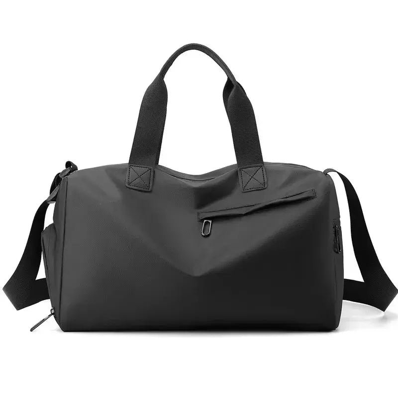 Black duffel gym bag with top handles, shoulder strap, and zippered front pocket