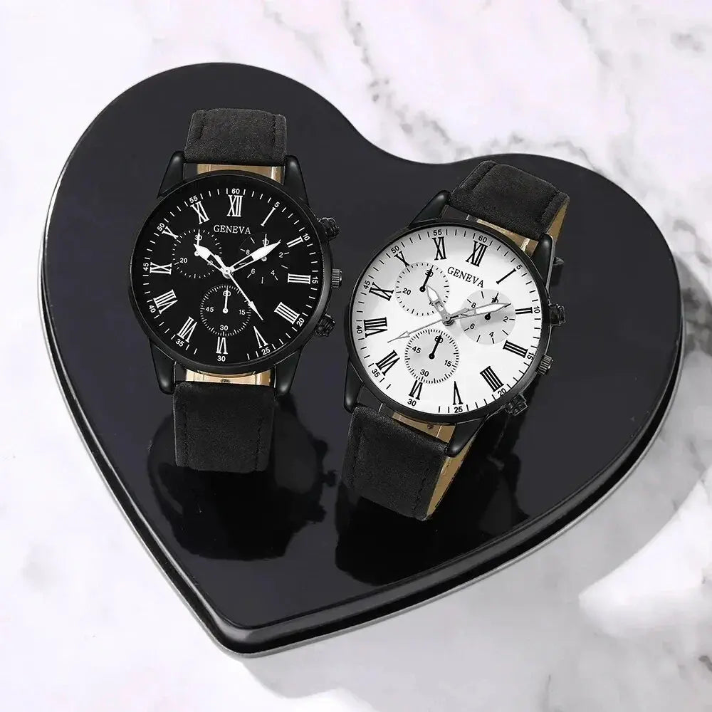 Couple leather quartz watches on a heart tray: black dial and white dial, black straps.