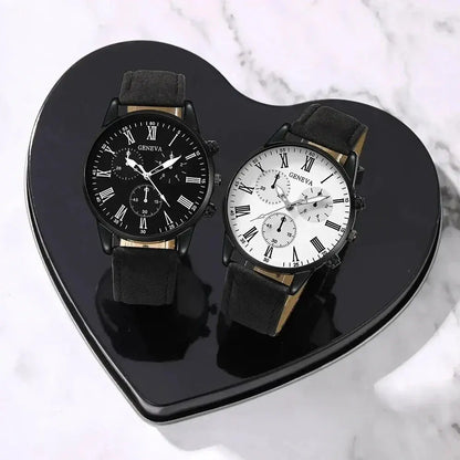 Couple leather quartz watches on a heart tray: black dial and white dial, black straps.