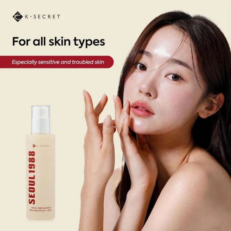 Facial essence bottle and model applying serum to cheek