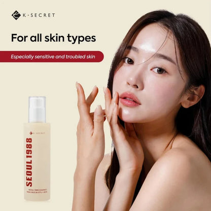 Facial essence bottle and model applying serum to cheek