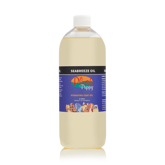 Plush Puppy Seabreeze oil bottle with white cap and beige liquid