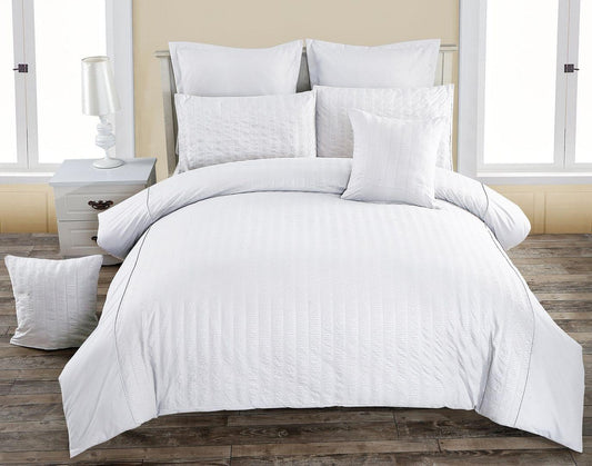 White seersucker duvet quilt cover set with matching pillowcases and pillows