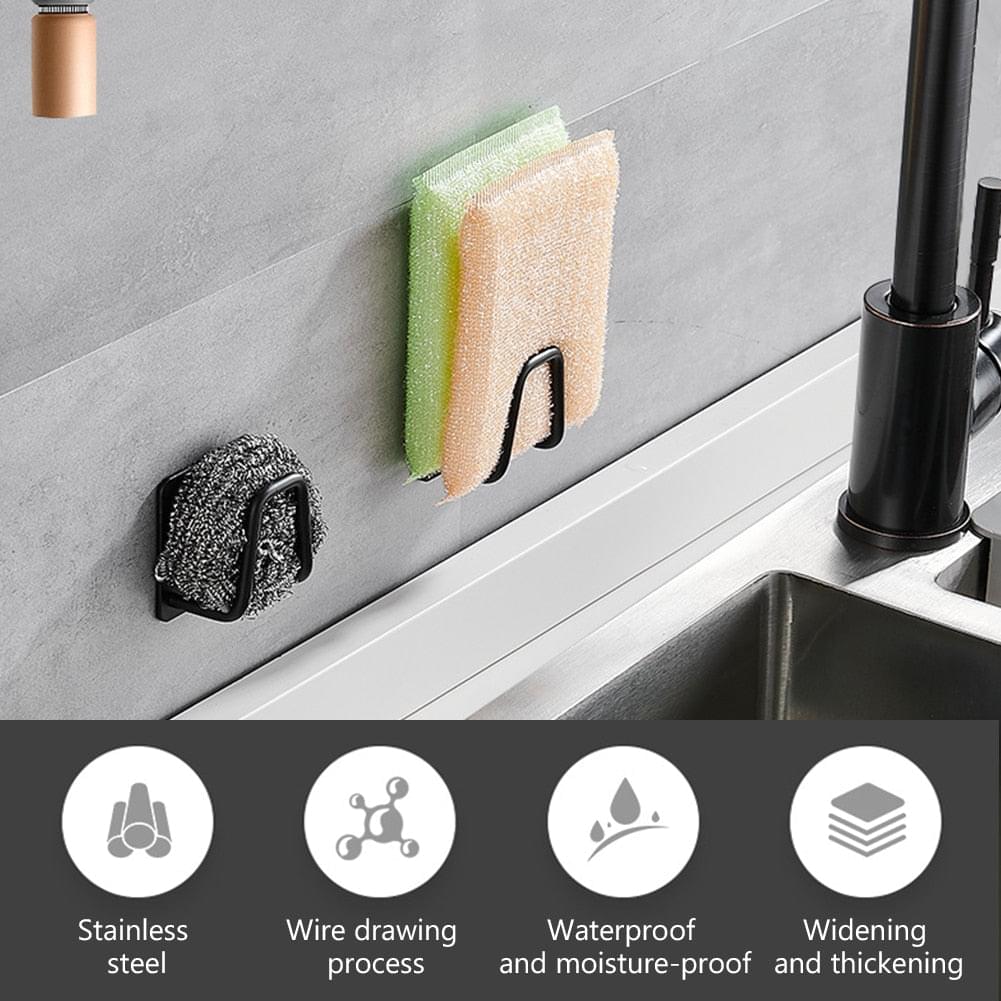 Wall sponge rack holding two scrub sponges on matte black double hooks