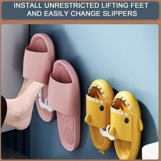 White hanging shoe rack holding pink and yellow slippers in U-shaped slots