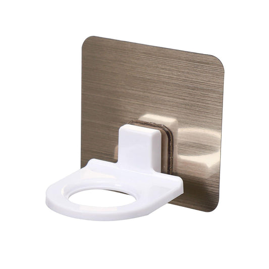 Self-adhesive shower gel bottle holder with white soap pump on silver backing plate