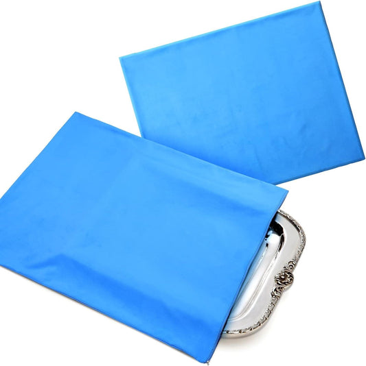 Blue zippered fabric storage pouch for silver flatware, partially filled.