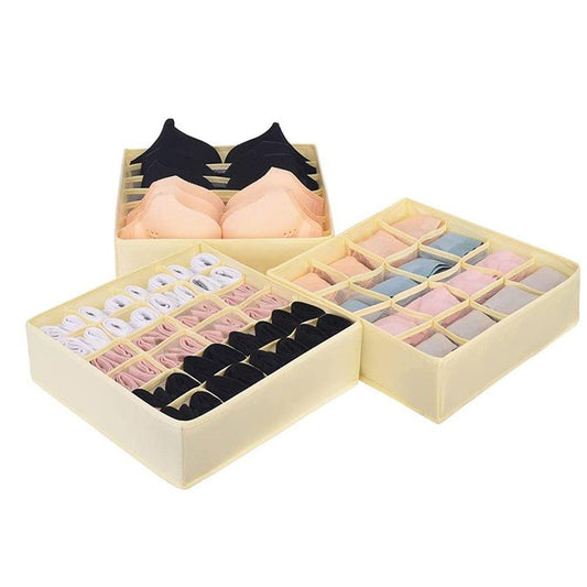 Beige sock drawer organizer with multiple fabric compartments and hinged lid