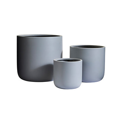 Light gray planter set with three round pots, nested with a smaller front pot