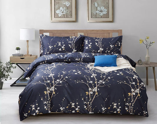 Navy floral duvet cover set with branch pattern and blue accent cushion