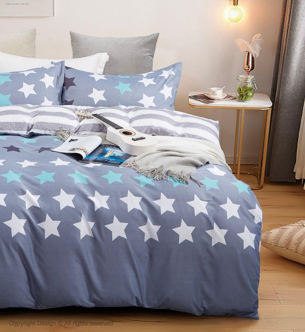 Super king duvet cover set with blue and teal stars, striped panel, matching pillow