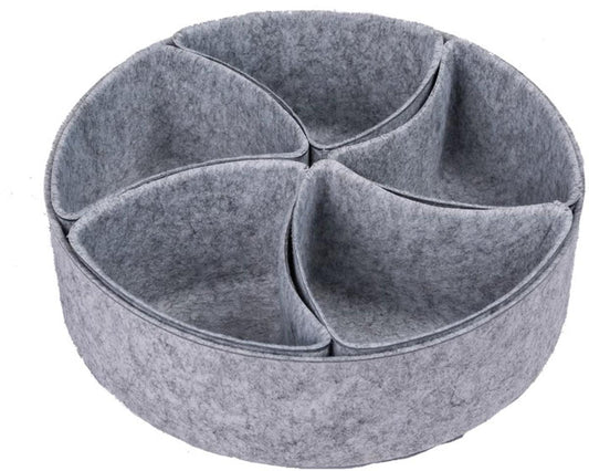 Gray felt round organizer with four padded divider sections for tidying small items
