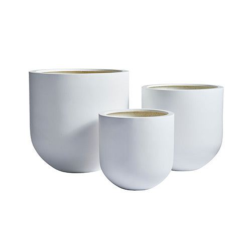 White planter trio with three round pots in graduating sizes and light interior bottoms