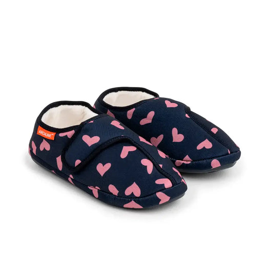 Navy slip-on orthotic slippers with pink heart pattern and cushioned lining