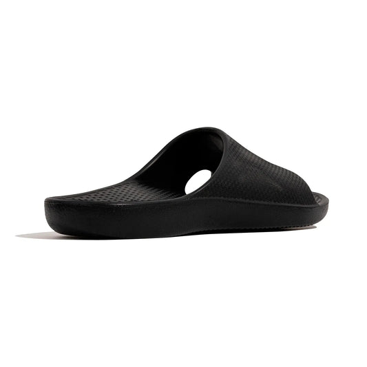 Black slide sandals with wide strap and contoured footbed.