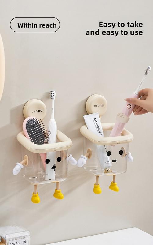 Cream suction cup toothbrush holder caddy with clear compartments and yellow hooks
