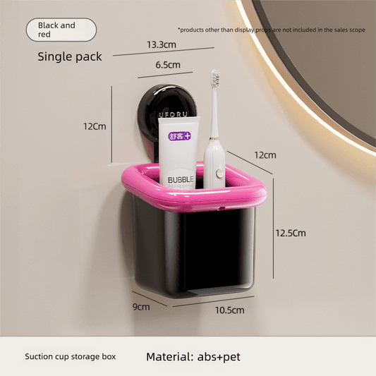 Wall-mounted suction toothbrush holder caddy with pink tray and black storage box