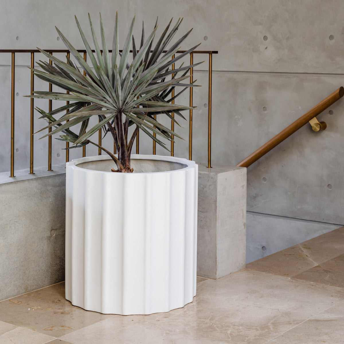 Ribbed planter pot, white cylindrical design with vertical ridges and flat rim