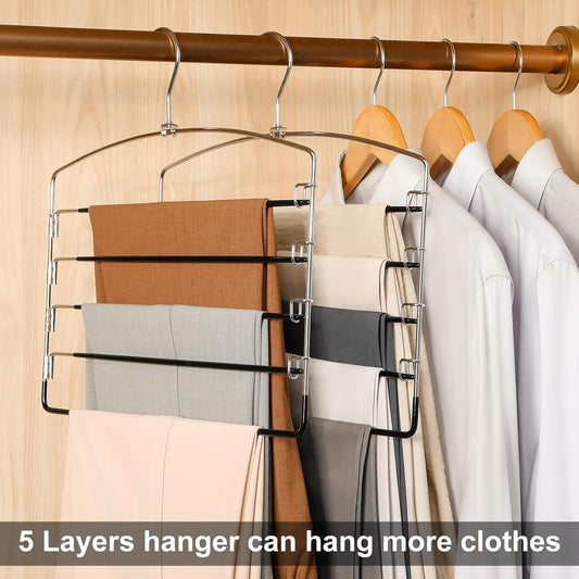 Multi-tier pant hanger on a closet rod holding folded trousers and pants