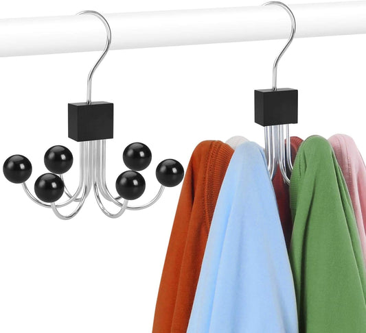 Sweatshirt hangers with black ball accents and curved metal hooks for scarves