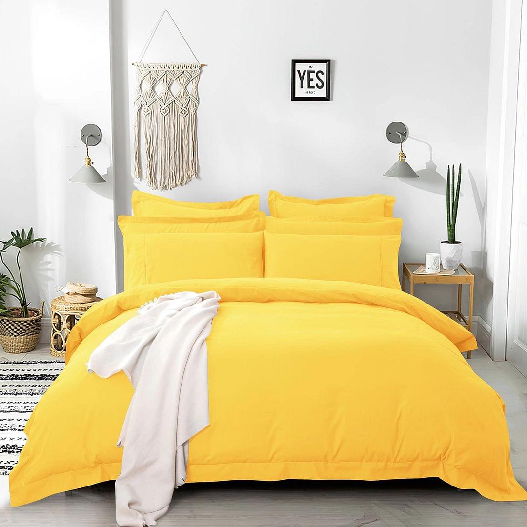 Yellow duvet quilt cover set with matching pillowcases