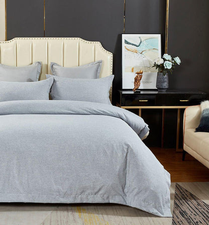 King quilt cover set with light blue duvet cover and matching pillow shams