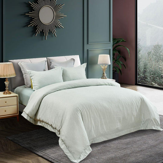 King-size quilt cover set in light mint with layered duvet and pillows
