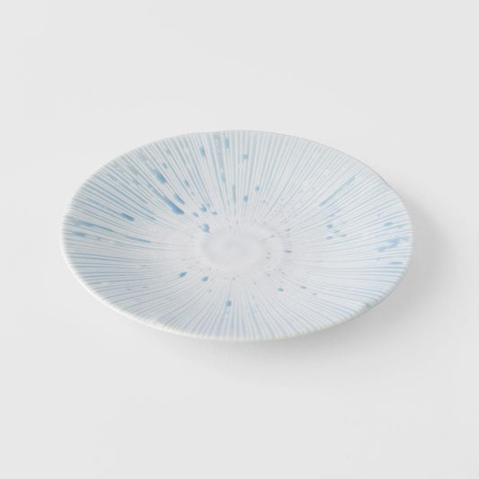 Ceramic tapas plate with ice blue glaze and white radial speckled pattern