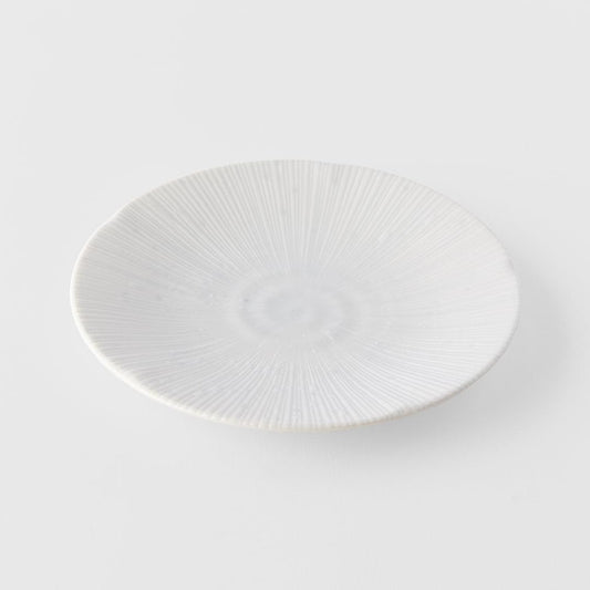 Ice white tapas plate, oval shape with radial ridges on the surface