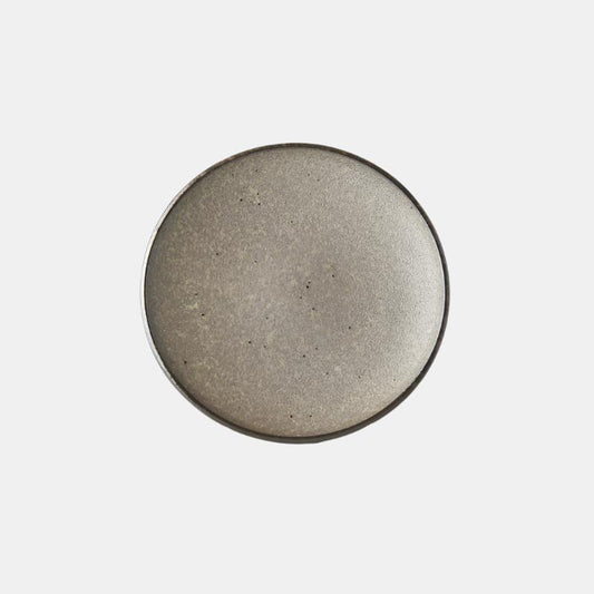 Round tapas plate, 17cm, speckled taupe-brown ceramic with thin dark rim.