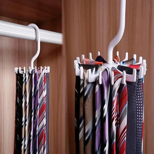 White tie organizer hanger on a closet rod holding multiple patterned ties