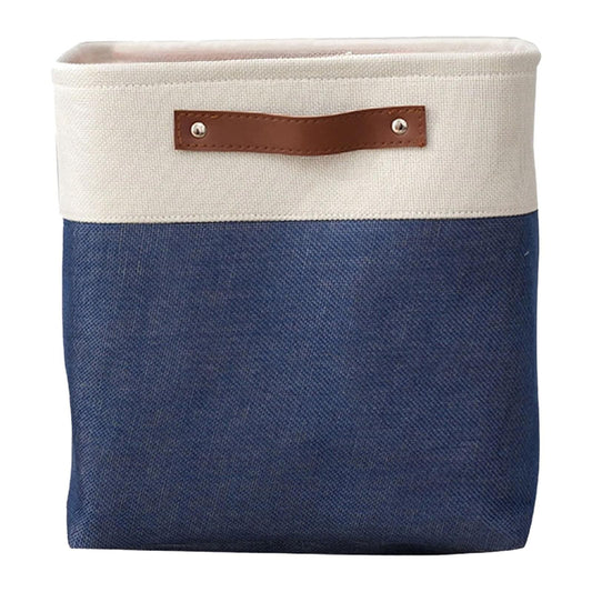 Two-tone fabric storage bag with brown handle patch, dark blue body and cream top