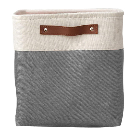 Two-tone fabric storage bag with top band and brown leather-look handle on gray body