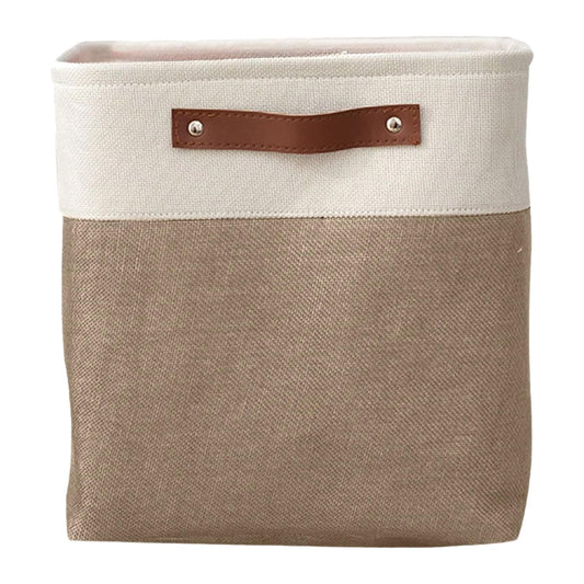 Rectangular fabric storage bag in tan with a white top band and brown handle strap