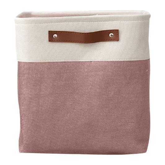 Two-tone fabric storage bag with cream top, pink body, and brown leather handle tabs