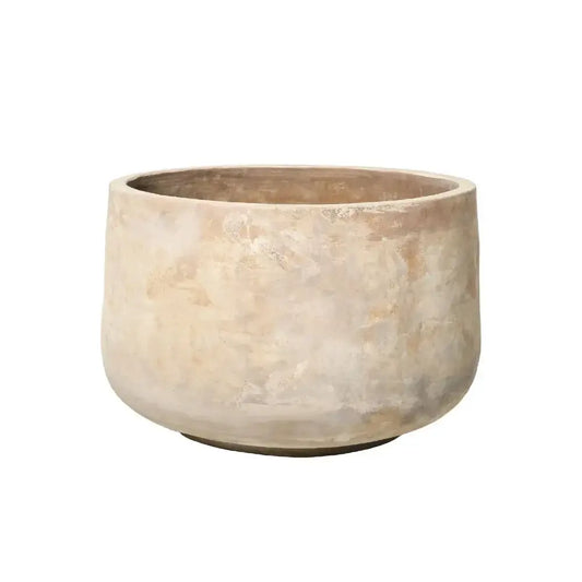 Round stone-look planter pot in light beige with textured surface