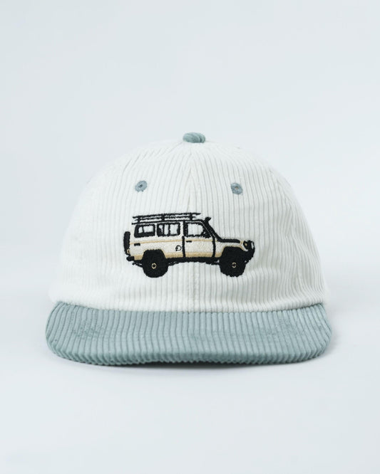 Troopy hat in white ribbed knit with teal brim and embroidered truck logo.